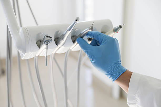 Professional Tooth Extraction technician working in Poydras, LA